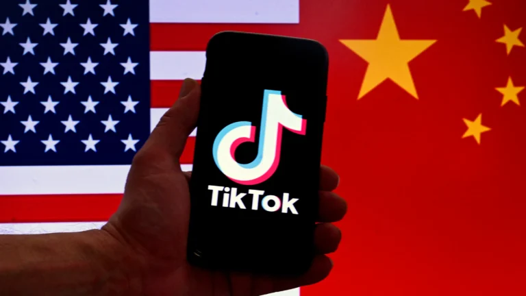 Tiktok ban in us webp image including a smartphone with tiktok logo and american and chinese flag behind the phone
